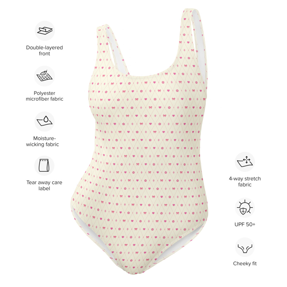 Preppy pink one piece swimsuit with heart, bow, flower, diamonds